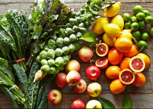 a group of fruits and vegetables on a wood surface Healthy Weight Loss Diets Halesowen